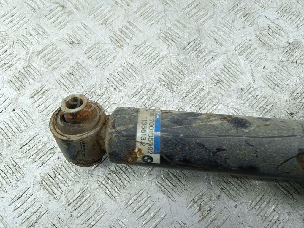 Амортизатор задний левый