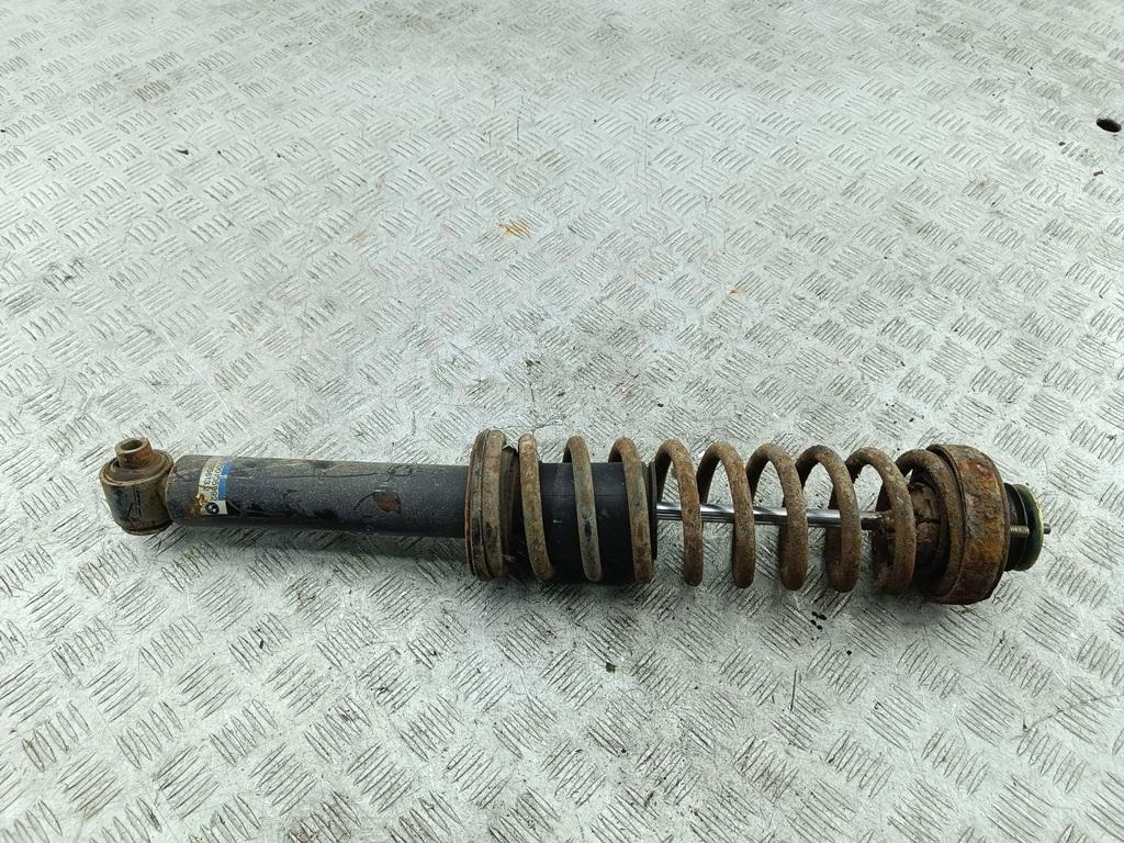 Амортизатор задний левый