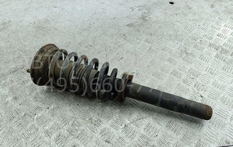 Амортизатор передний левый