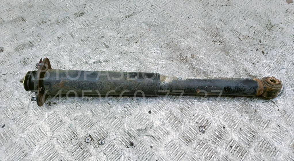 Амортизатор задний левый