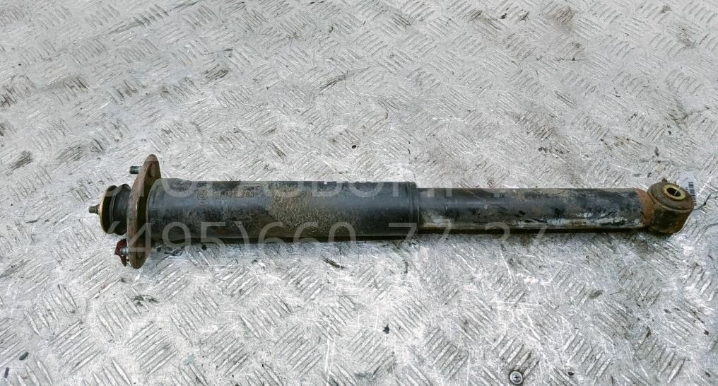 Амортизатор задний левый