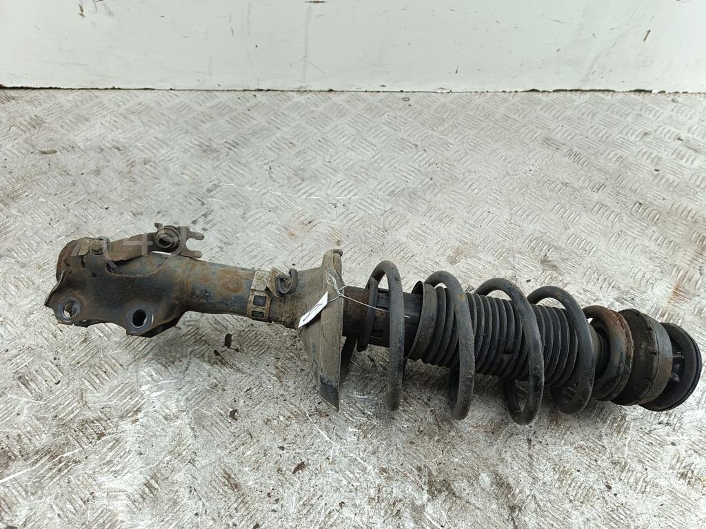 Амортизатор передний левый