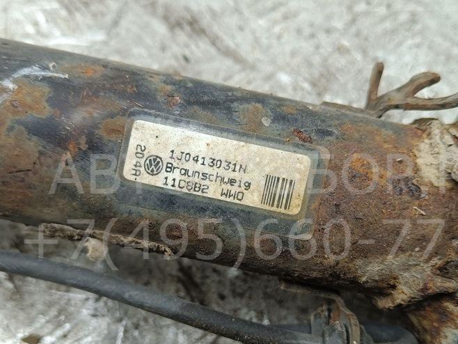 Амортизатор передний левый