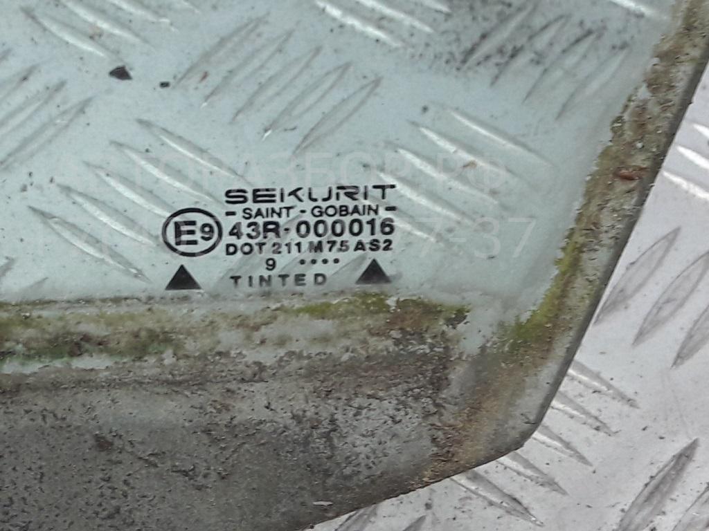 Стекло двери передней левой