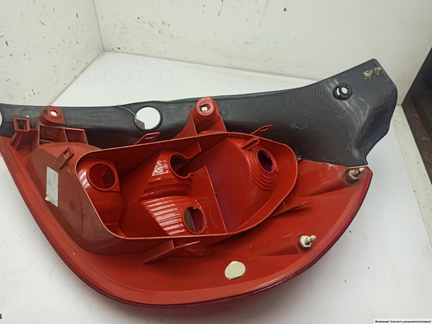 Фонарь задний левый