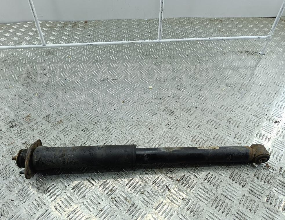 Амортизатор задний левый