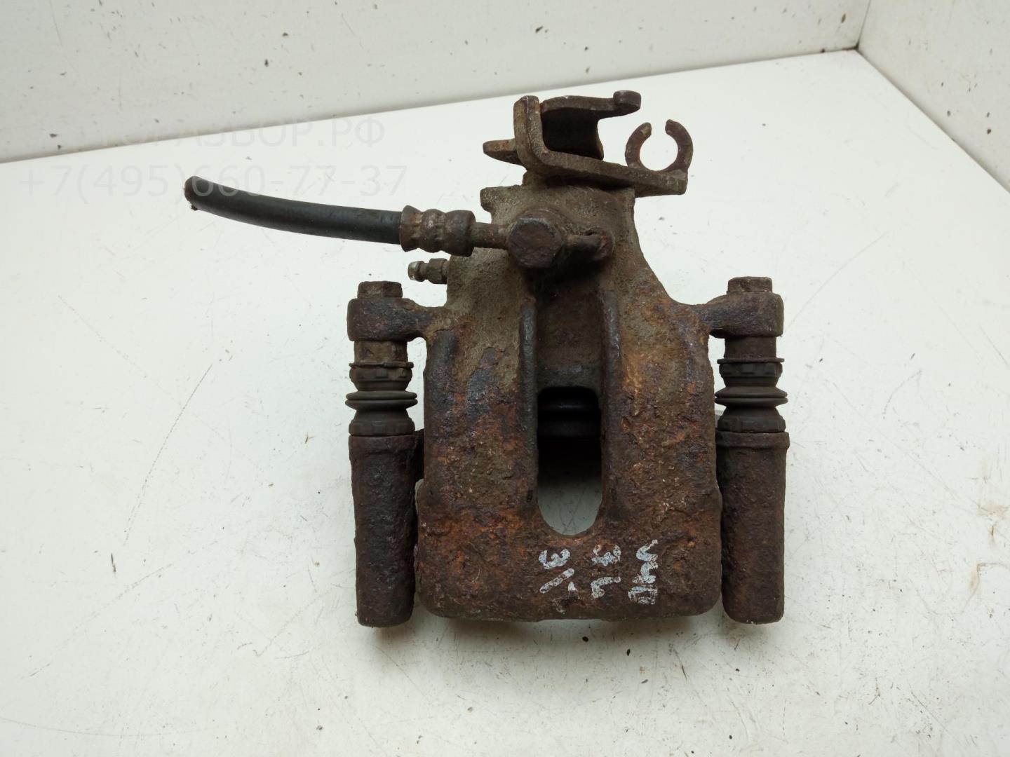 Суппорт задний левый