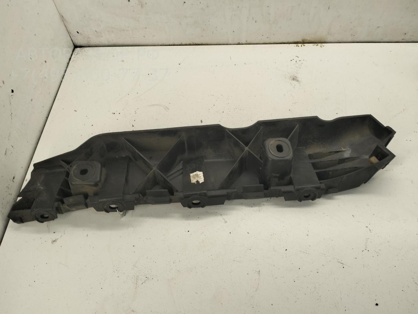 Кронштейн заднего бампера левый