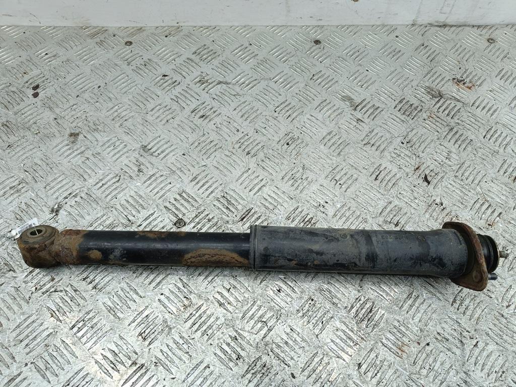 Амортизатор задний левый