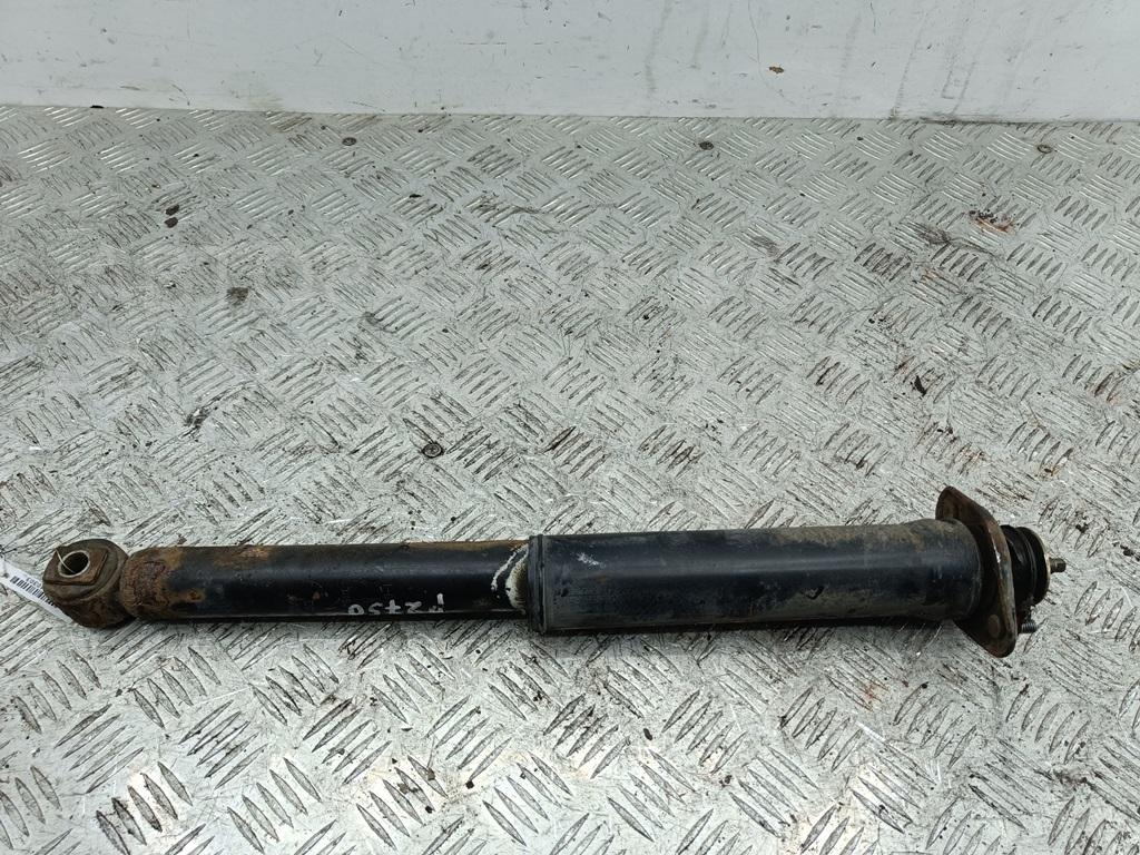 Амортизатор задний левый