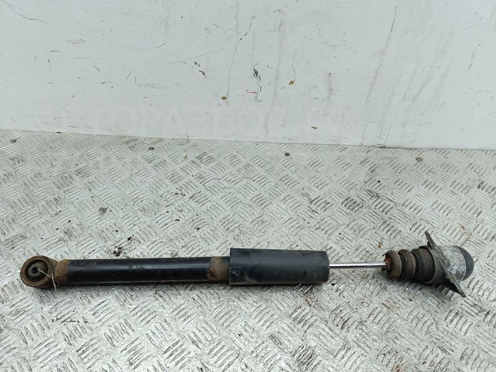 Амортизатор задний левый