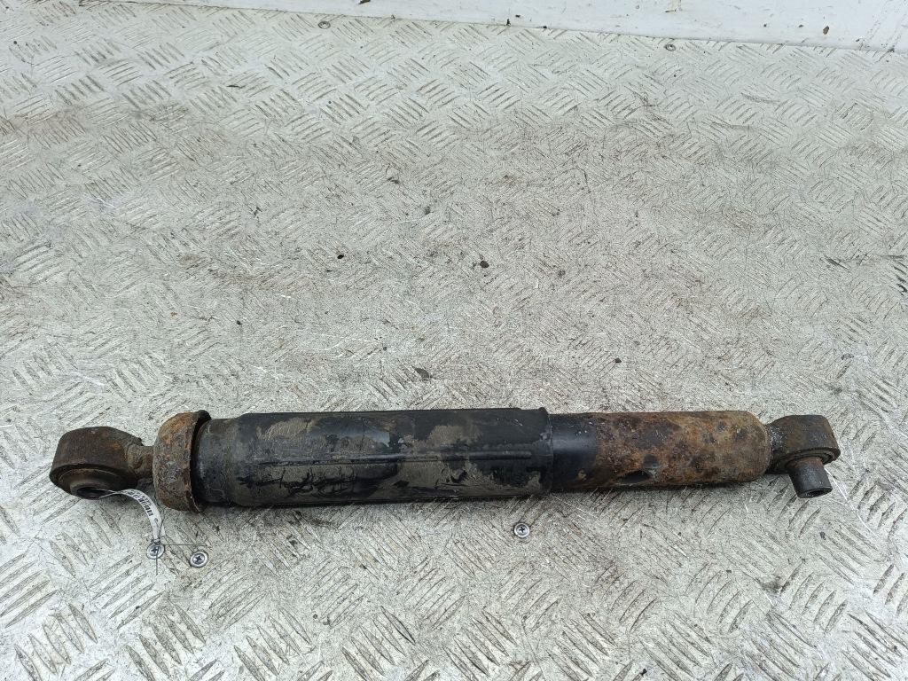 Амортизатор задний левый