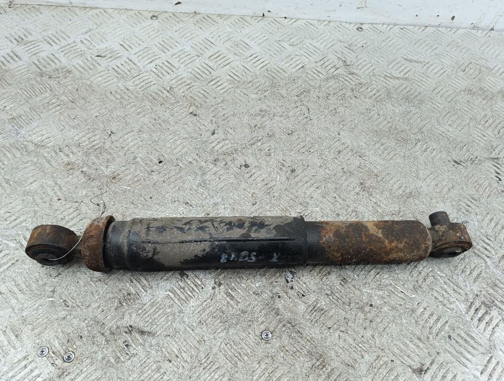 Амортизатор задний левый