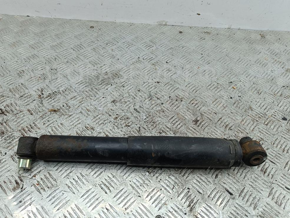 Амортизатор задний левый