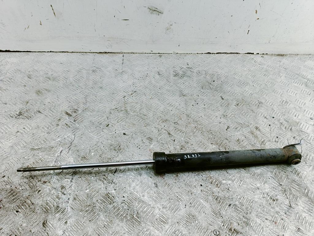 Амортизатор задний левый