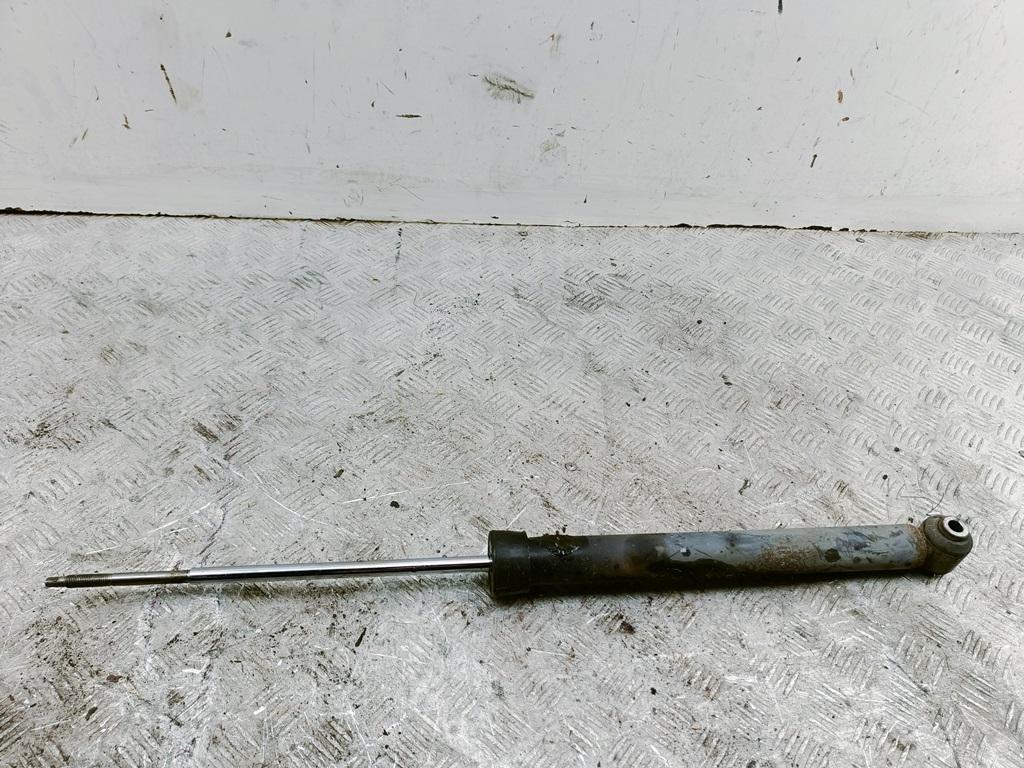 Амортизатор задний левый