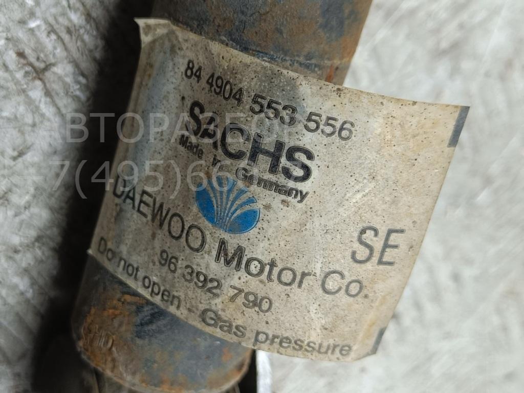 Амортизатор задний левый