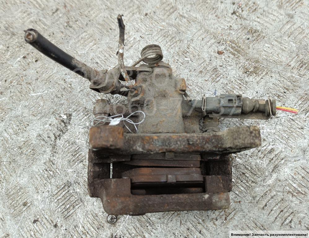 Суппорт задний левый