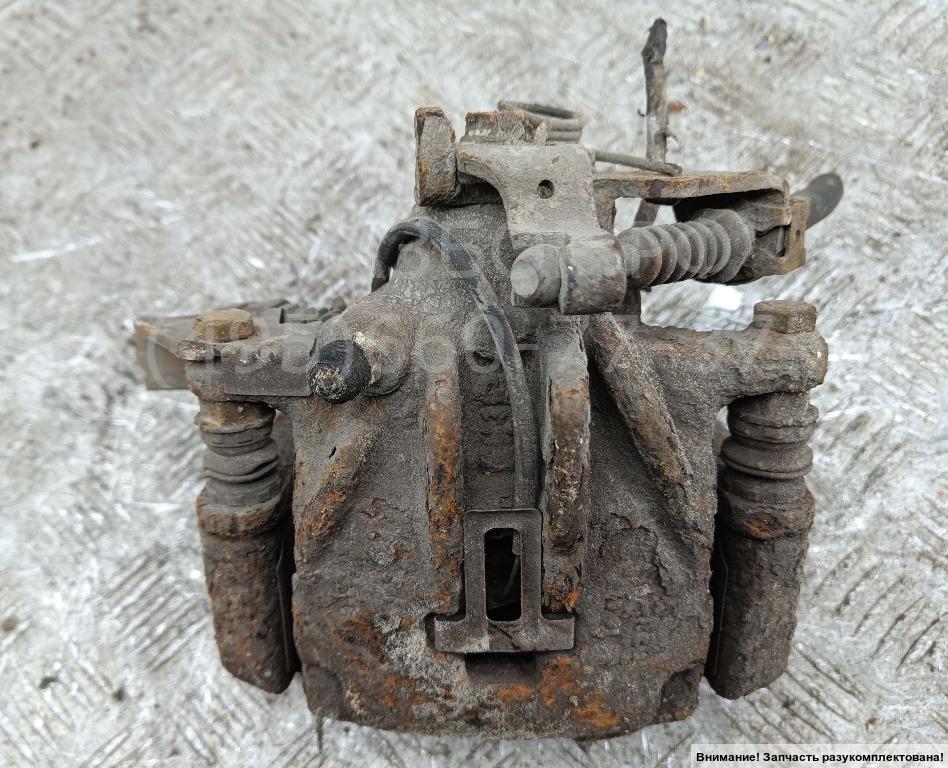 Суппорт задний левый