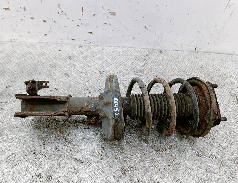 Амортизатор передний левый