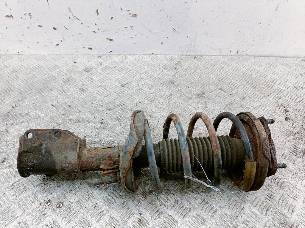 Амортизатор передний левый