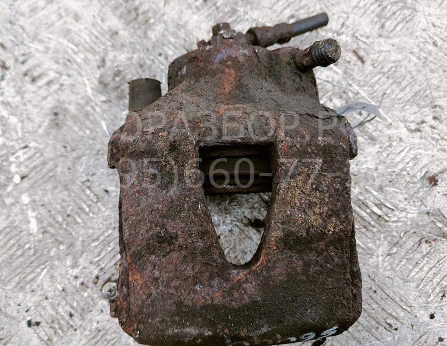 Суппорт передний левый