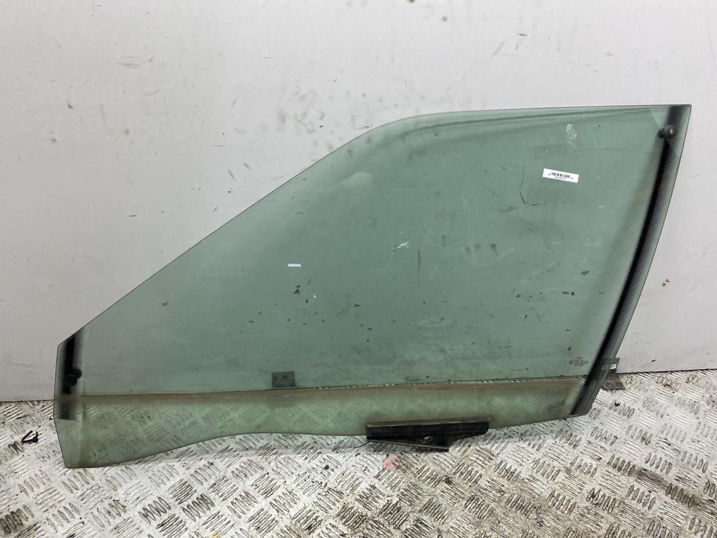 Стекло двери передней левой