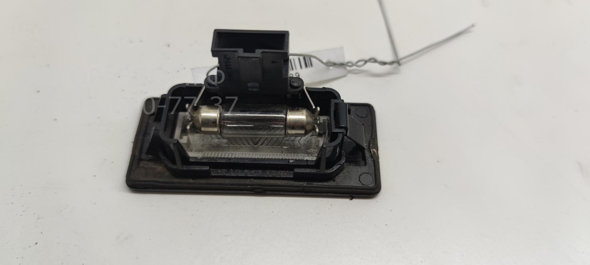 Фонарь подсветки номера