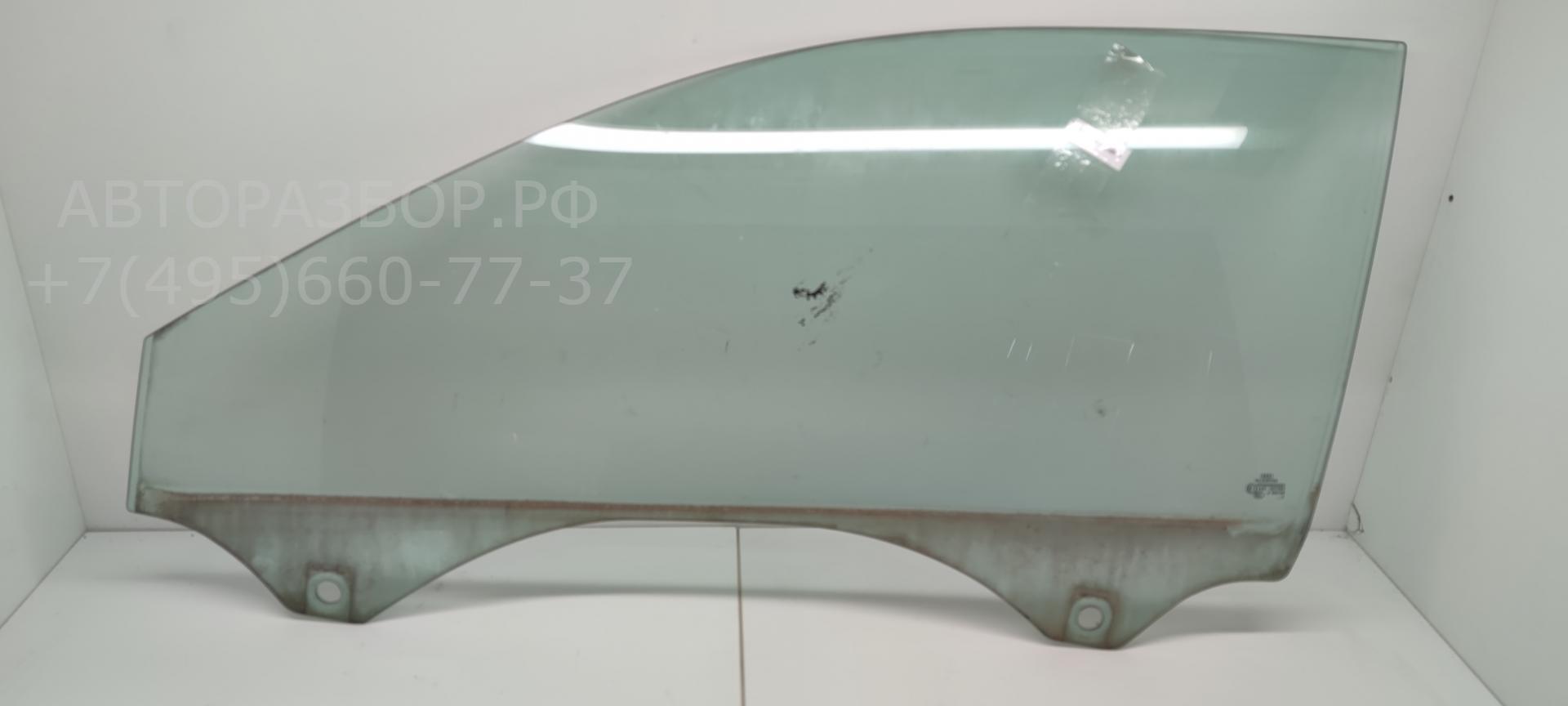 Стекло двери передней левой