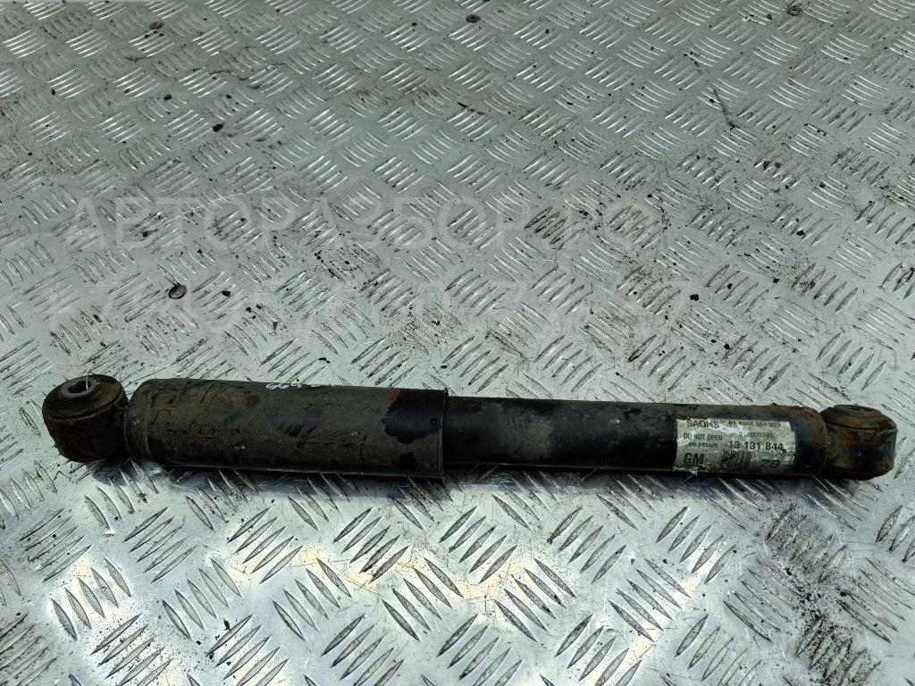 Амортизатор задний левый