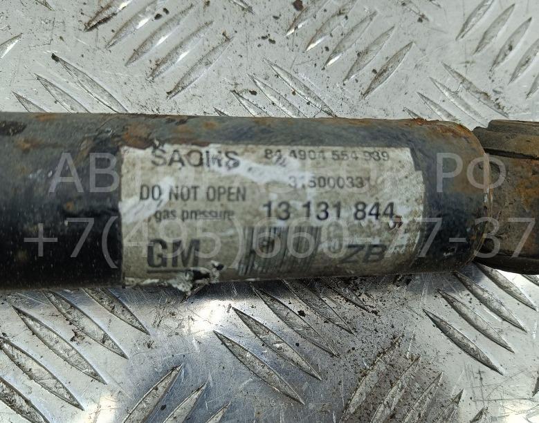 Амортизатор задний левый