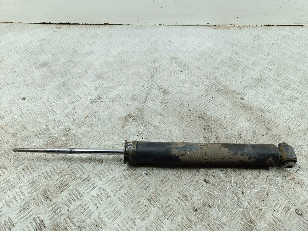 Амортизатор задний левый