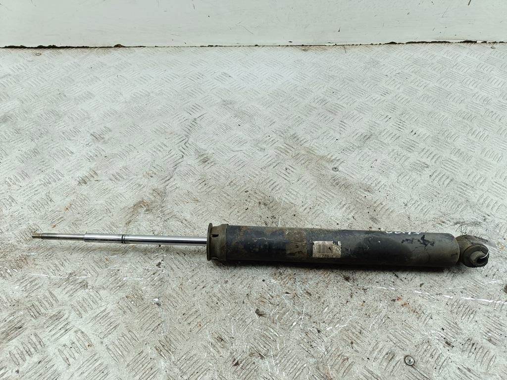 Амортизатор задний левый