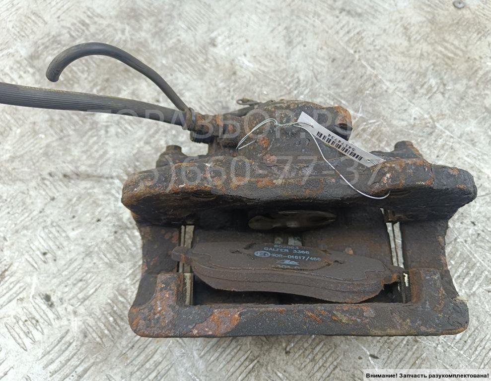 Суппорт передний левый