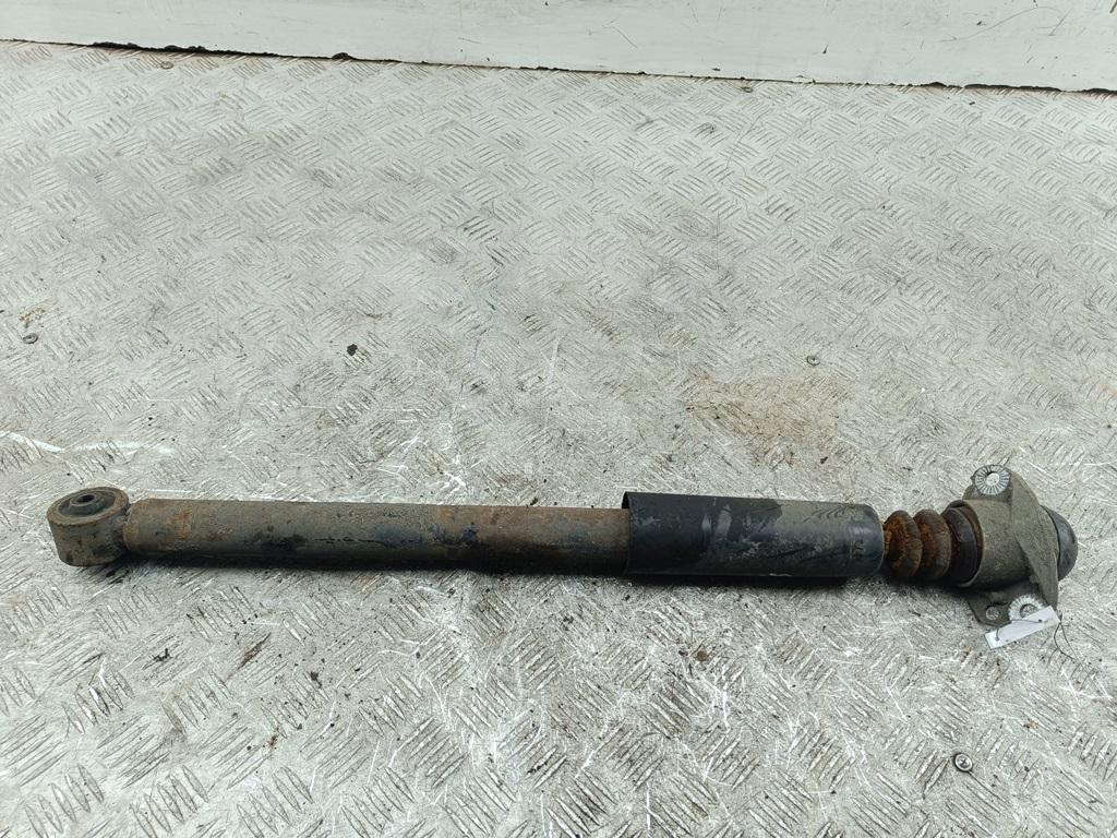 Амортизатор задний левый