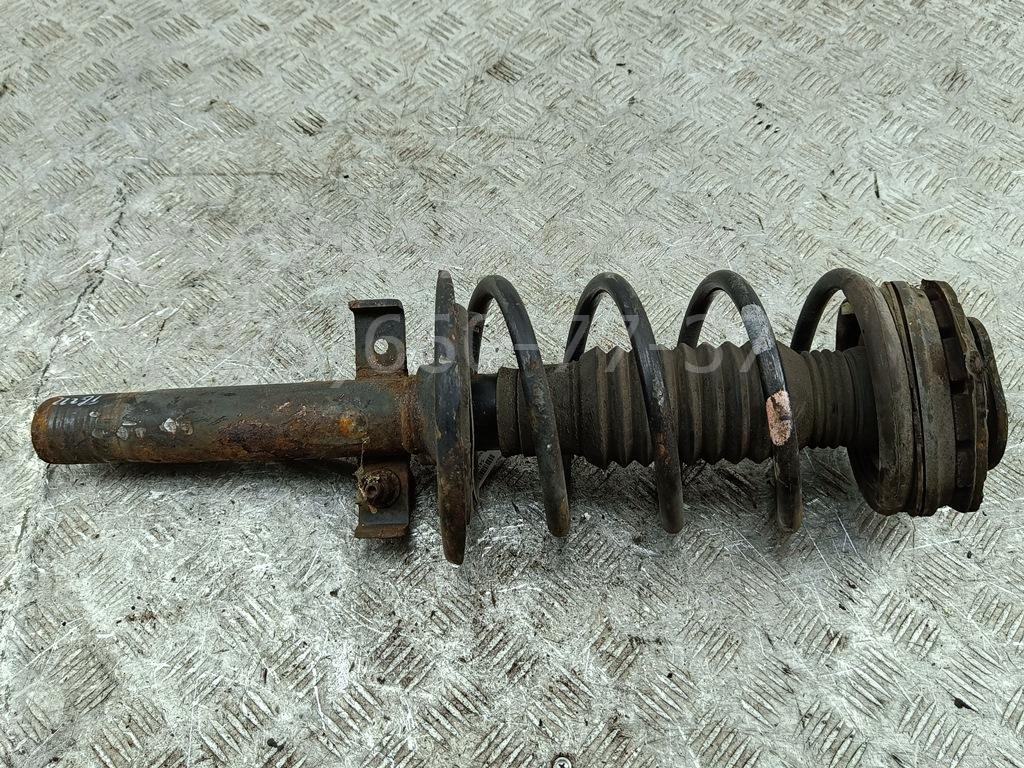 Амортизатор передний левый