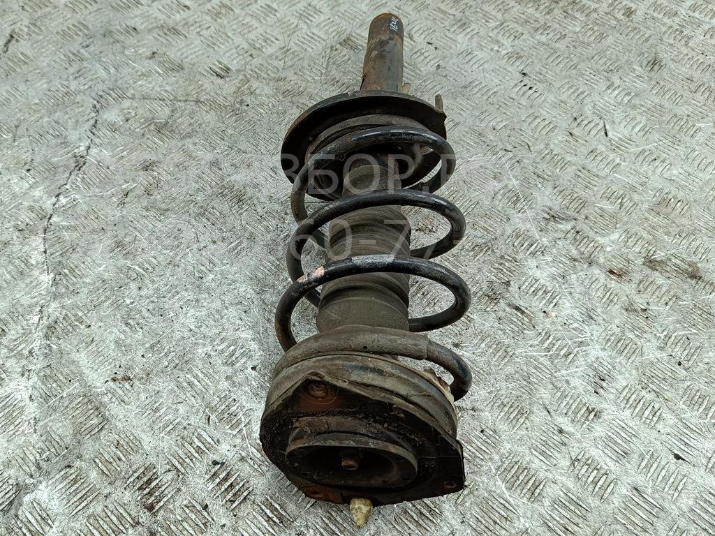 Амортизатор передний левый