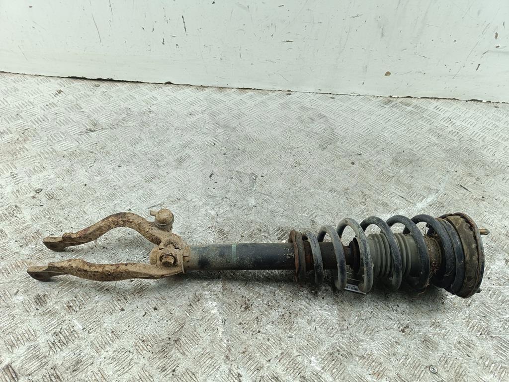 Амортизатор передний левый