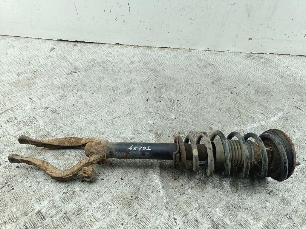 Амортизатор передний левый