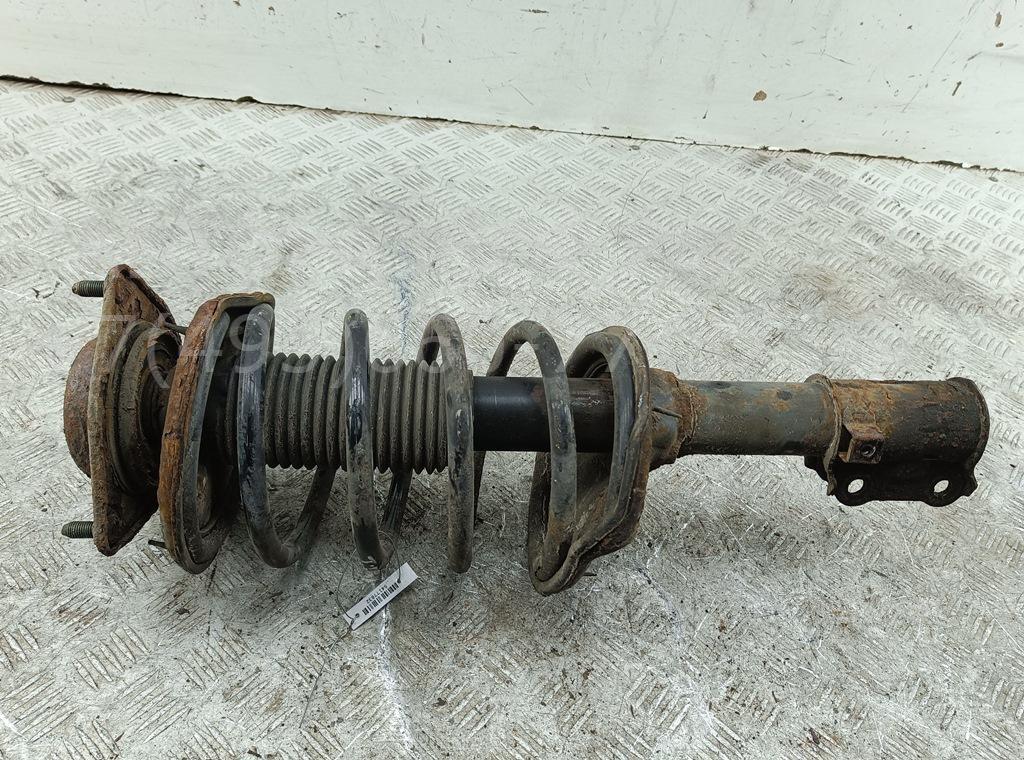 Амортизатор передний левый