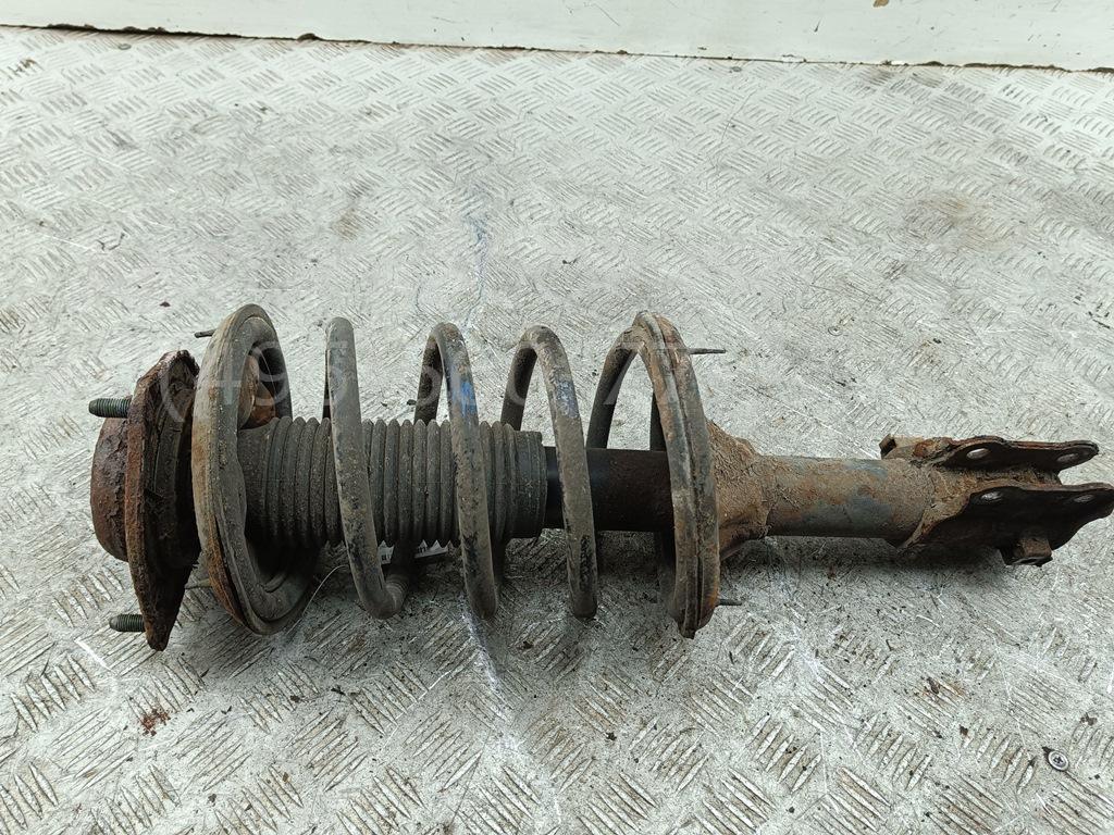 Амортизатор передний левый