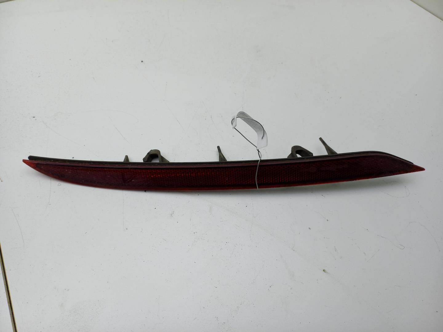 Отражатель в бампер задний левый