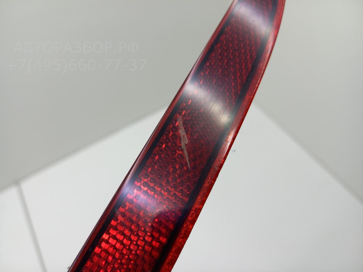 Отражатель в бампер задний левый