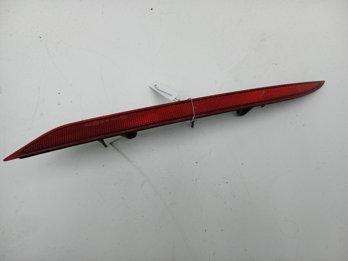 Отражатель в бампер задний левый