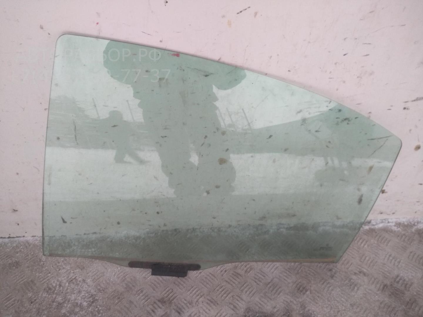 Стекло двери задней левой