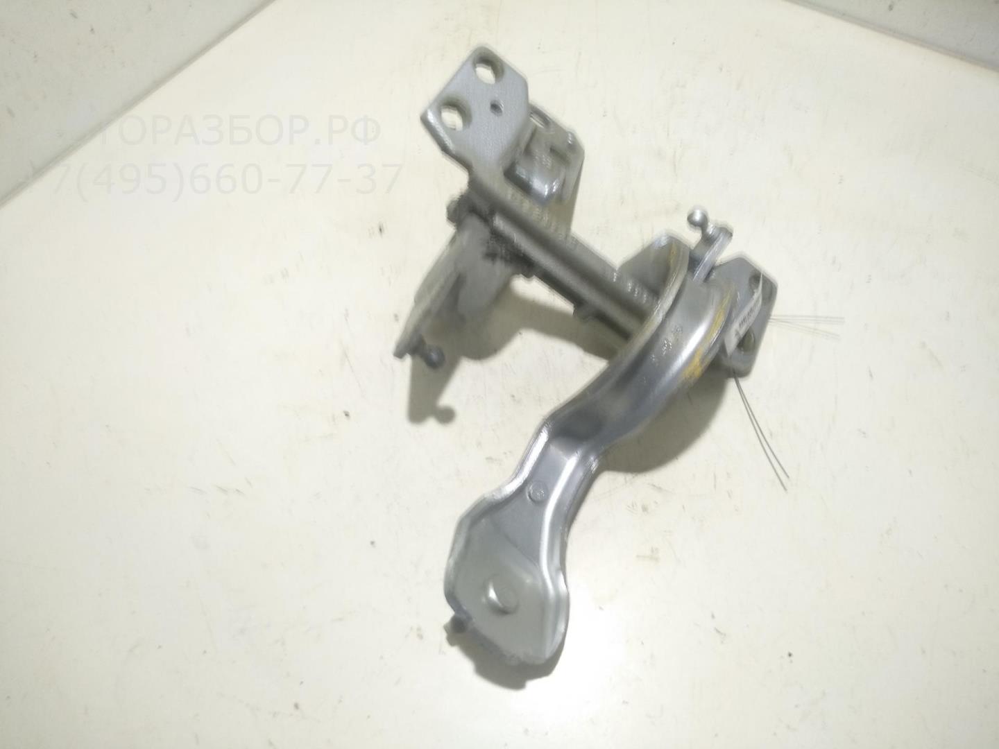 Петля крышки багажника