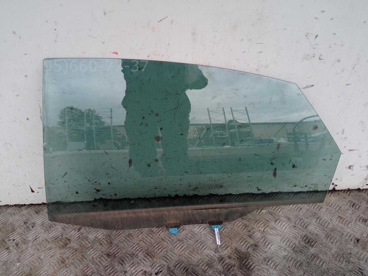 Стекло двери задней левой