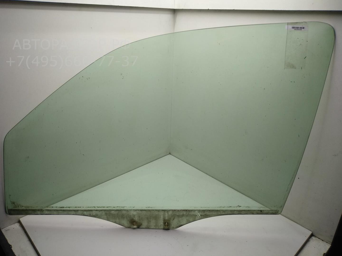 Стекло двери передней левой