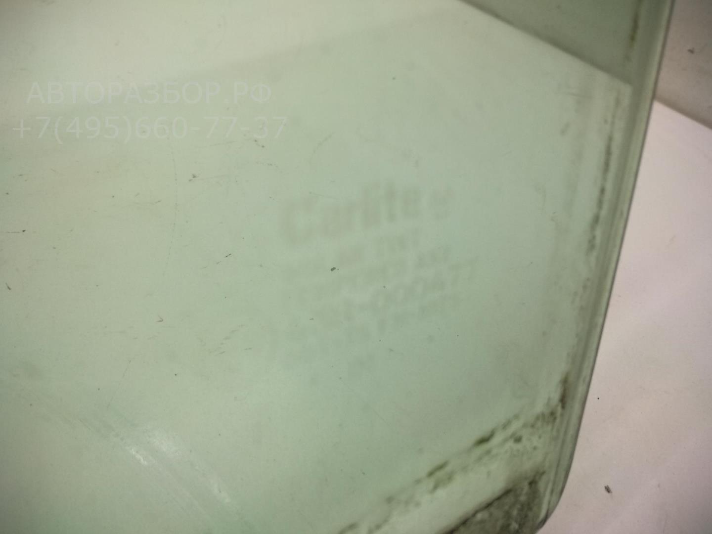 Стекло двери передней левой