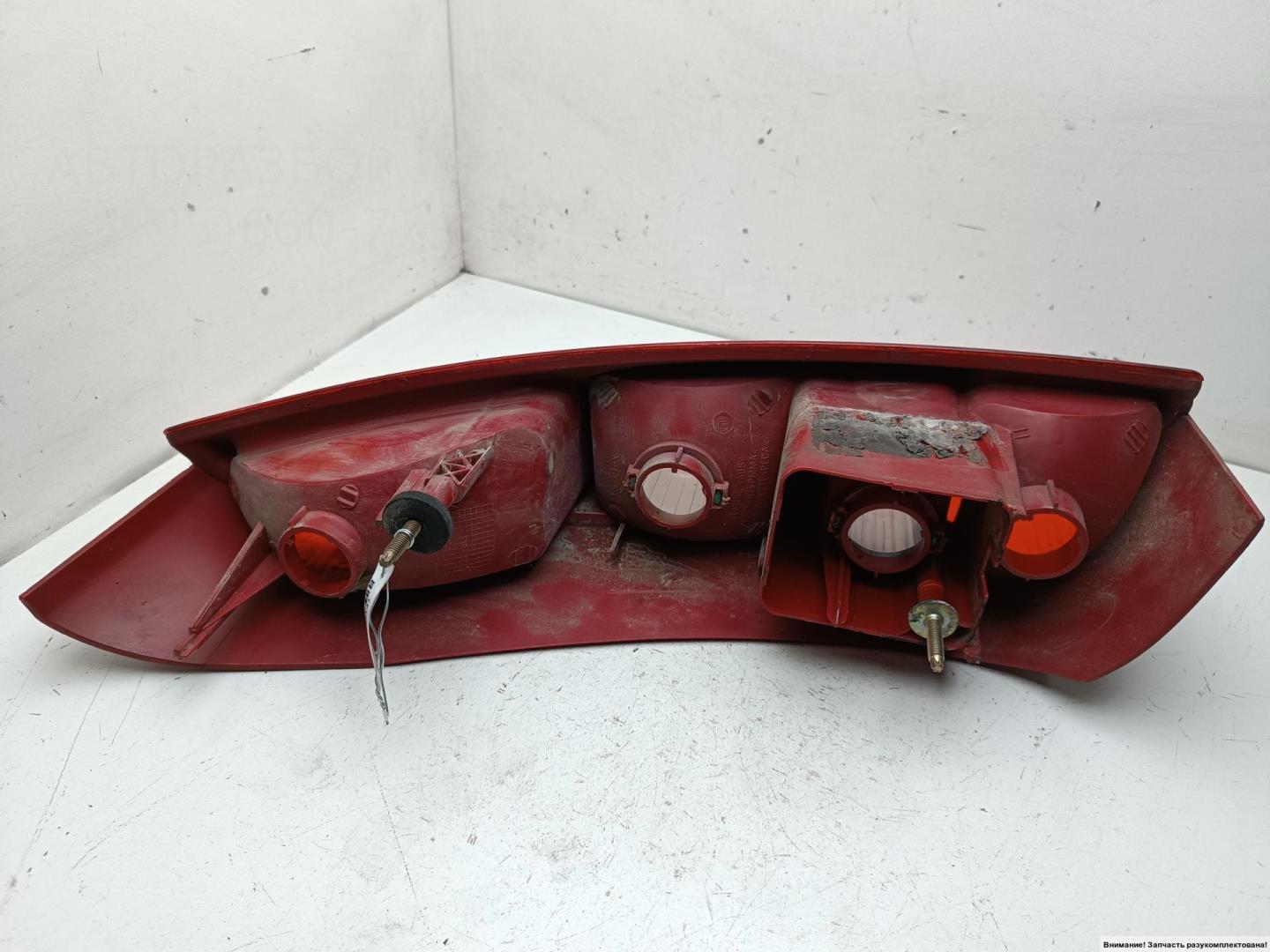 Фонарь задний левый